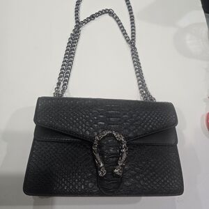 Elegant Black Chain Crossbody Bag. Snake Pattern